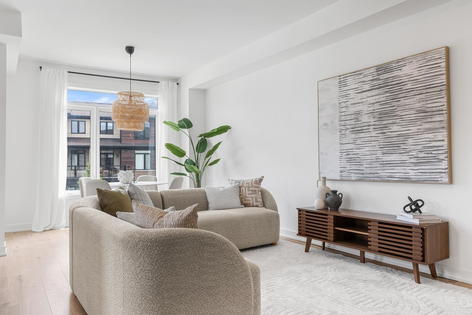 Living Room 555 - Partial Furniture Rental for a Townhouse in Hamilton, sold for  $605K